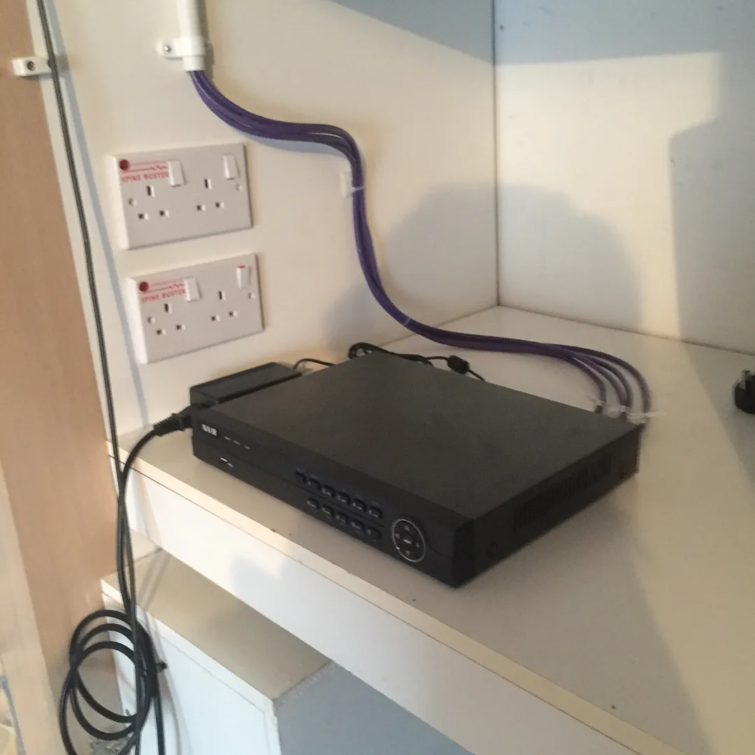 CCTV recorder wired to surge-protected sockets