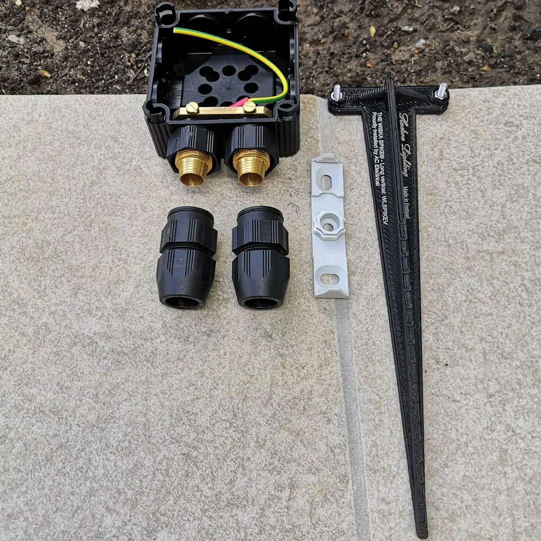 Wiska ground-spike garden-lighting fitting, branded as installed by AC Electrical